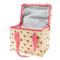 Insulated lunch bag decorated with a floral pattern and a zip opening