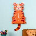 Tiger-shaped wooden wall clock in orange, featuring a white numbered dial with clock hands and a tail