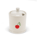 stoneware sugar pot with lid on, featuring a red cherry print and a small handle on top