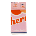 Cotton tea towel featuring a cherry print with pink background in a packaging