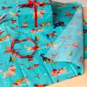 festive friends tissue paper feature illustrations of dogs in winter clothing 