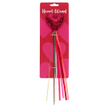 Red heart wand with glittery top and ribbon streamers in packaging