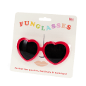 red heart-shaped funglasses in packaging