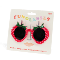 Red strawberry-shaped funglasses with green leaves, and dark round lenses with packaging