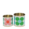 Two floral storage tins, one small with pink daisy and one large with green and blue daisy print