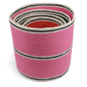 Stacked woven storage baskets in varying sizes and colours 