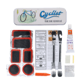cyclist puncture puncture repair kit beside a storage tin