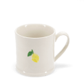 Stoneware mug featuring a yellow lemon print with green leaves and handle 