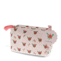 Rectangular makeup bag in pale pink with a floral pattern of small red and green flowers with tag