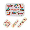 Sausage dog-printed plasters placed beside a matching storage tin featuring sausage dog illustrations