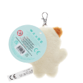 Cat-shaped plush keyring with a metal clasp and a tag with safety warnings