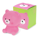 Pink teddy bear night light shown next to its packaging box 