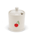 stoneware sugar pot with lid on, featuring a red cherry print and a small handle on top