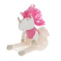 Knitted unicorn toy wearing a pink top and skirt