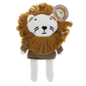 Knitted lion toy wearing a striped sweater, with white knitted legs with tag