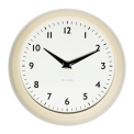 Round cream wall clock with black hands and numbers