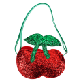 Children’s glitter handbag shaped like a red cherry, with green leaves and a green strap