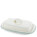 Rectangular white enamel butter dish with a pistachio green rim and a handled lid.