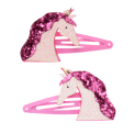 Pair of pink hair clips with glittery unicorn heads