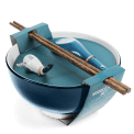 Blue ceramic noodle bowl set with spoon, chopsticks, and fish-shaped rest