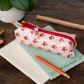 Pencil case in pink featuring colourful illustrations of red cherry print