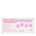 Back of packaging for pink disco ball string lights with product details and safety warnings.