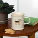 Stoneware mug featuring a dog with handle 