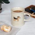 Stoneware mug featuring a dog with handle 