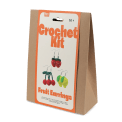 Crochet kit packaging front view with printed strawberries, lemons, and cherries