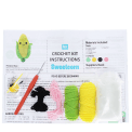 Crochet kit with yarns, hook, needle, stuffing, and instructions to make your own sweetcorn keyring