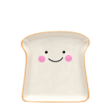 Ceramic trinket dish shaped like a slice of bread with a smiling face and pink cheeks