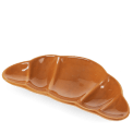 Brown ceramic trinket dish shaped like a croissant.