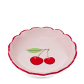 round ceramic trinket dish with scalloped red edge and cherry design in the center