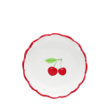Round ceramic trinket dish with scalloped red edge and cherry design in the center.