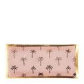 Rectangular trinket dish with gold rim and palm tree pattern on a pink background