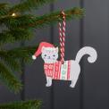 Wooden Christmas decoration of grey cat wearing festive jumper and hat hanging on tree