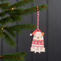 Wooden hanging Christmas decoration of pug dog wearing festive jumper and hat hanging on tree