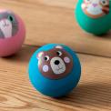 Blue bouncy ball with a bear face design
