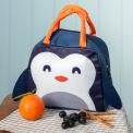 Navy blue lunch bag with orange handles and a cute penguin face design on the front and a black wings on each side