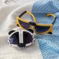 sunglasses with white snow leopard and yellow tiger design.