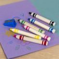 Six jumbo wooden crayons in different colour with a blue sharpener. 