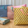 Colourful patterned jumbo storage bags in different prints.