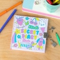 Colourful secret diary with cute cartoons illustrations and a padlock on the cover.