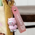 Polar bear bag charm with pink hoodie, silicone wrist strap and silver keyring
