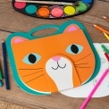 Orange cat-faced sketchbook with teal handle, stylised eyes, whiskers and ears.