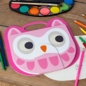 Pink owl-faced sketchbook with a carry handle, large eyes and orange beak.