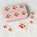 Cherry-themed plasters in a pink tin with individual plasters shown.