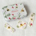 Garden bees plasters in tin with matching bee and floral plasters shown.