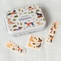Dog-themed plasters in a tin, shown with assorted designs.