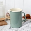 Pistachio green enamel jug with pour spout, white interior and 1.7 litre capacity.